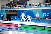 Deutsch: Fechten bei den Olympischen Jugend-Sommerspielen 2018: Tag 1, 7. Oktober 2018, Jungen, Säbel, Finale - Krisztián Rabb (HUN) - Hyun Jun (KOR) (USA) 15:13 English: Fencing at the 2018 Summer Youth Olympics at 7 October 2018 – Boys' sabre Gold medal match – Krisztián Rabb (HUN) Vs Hyun Jun (KOR) (USA) 15:13