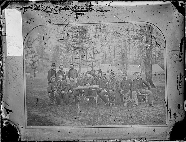 Council of War with generals, Gen. Thomas seated third from right, Camp Ringgold, Georgia.