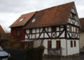 English: Half-timbered building in Giessen/Roedgen Kirchenring 15 / Hesse / Germany This is a picture of the Hessian Kulturdenkmal (cultural monument) with the ID 61987 (Wikidata)