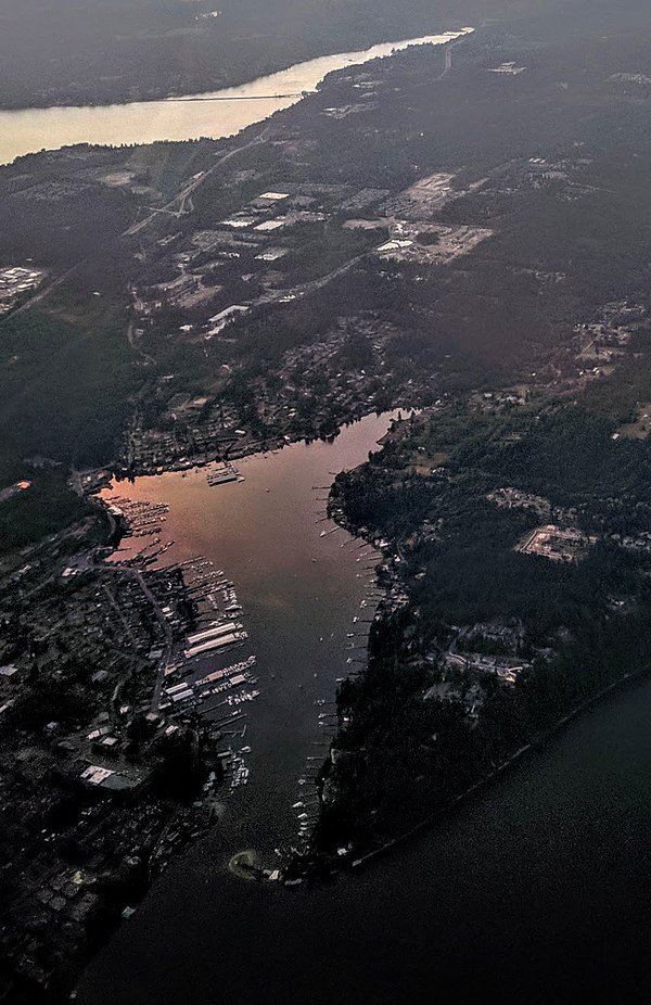 Aerial view, looking northwest, of the harbor and town of Gig Harbor, with Henderson Bay in background