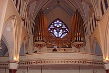 The pipe organ was restored in 2000 and contains 2,899 pipes. Holy Rosery Pipe Organ.JPG