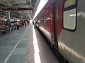 Howrah-New Delhi Duronto Express standing on platform 3 of Jasidih Junction railway station.jpg