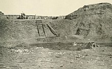 Fort Fisher Cropped Interior view of the northeast angle Showing the site of the reserve powder magazine that exploded. InsideRampartsofFortFisher.jpg