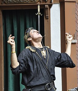 Johnny Fox sword swallowing at the Maryland Renaissance Festival in 2016, before his diagnosis