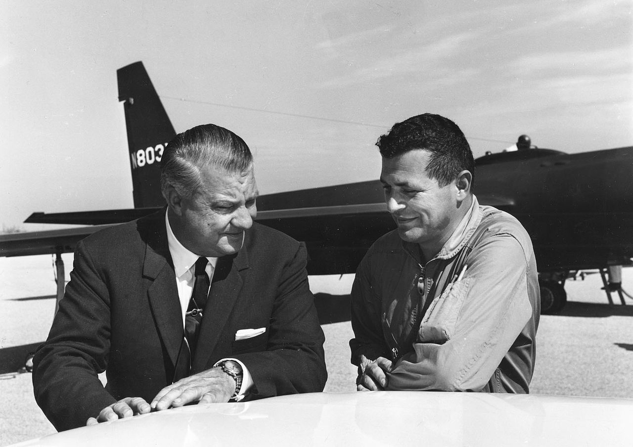 Kelly Johnson and Gary Powers in front of a Lockheed U-2IU-2 plane.