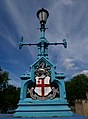 Lamp posts on Tower Bridge Approach, created in 1894. [575]