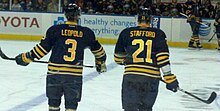 Stafford skating with teammate Jordan Leopold in 2011 Leopold and Stafford.jpg