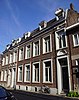 Drie woonhuizen met voorgevel in eclectische stijl