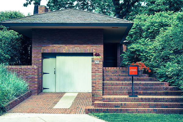 The Malcolm Willey House, a precursor to the Usonians; view of garage and iconic entry steps