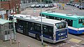 English: The rear of Metrobus 577 (YT09 BKU), a Scania CN230UB OmniCity, at Horley station interchange, Horley, Surrey, on Crawley Fastway route 20. As part of Phase 1 of Surrey County Council's Bus Review, route 20 was revised from 28 August 2010. One change was that it was diverted to call into Horley station interchange. However, the new timetable proved unreliable, and eventually a new timetable was introduced from 12 February 2011. Combined with the fact the use of the interchange was lower than Surrey CC expected, it was sometimes blocked by illegally parked cars, and most of all it took up running time in the timetable, the route was taken back out of the interchange from the new timetable. While it might sound bad, there are actually bus stops right outside the main station entrance, which is built up around a road bridge over the railway. Route 20 serves these bus stops, so interchange with train services wasn't really affected.