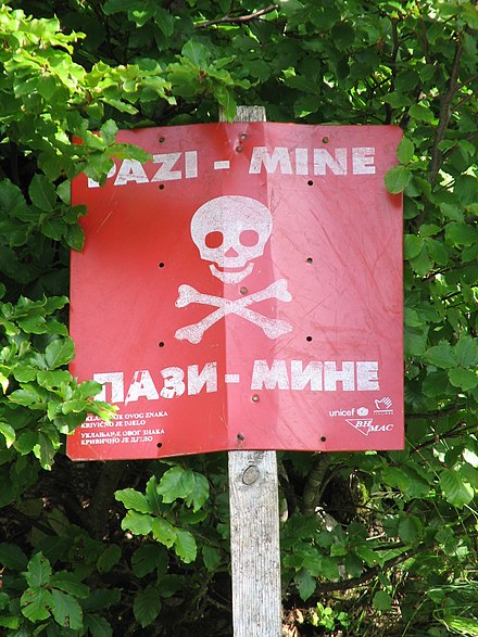 Land mine warning sign