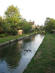 Straight section of the New River passing through Bowes Park. New River Bowes Park.jpg