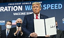 President Trump displays Executive Order 13962, which requires priority access to COVID-19 vaccines developed in the United States, signed December 8, 2020 Operation Warp Speed Vaccine Event (50705630873) (cropped).jpg