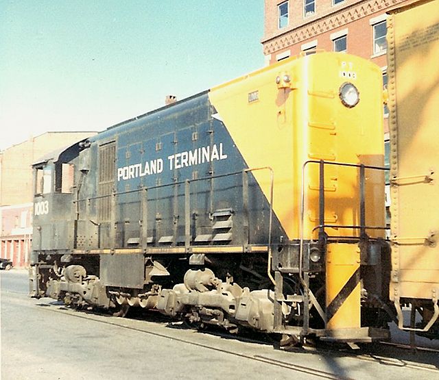 Portland Terminal Company working on Commercial Street (Yard 2) in the summer of 1968. The recently applied yellow nose was the third paint scheme for