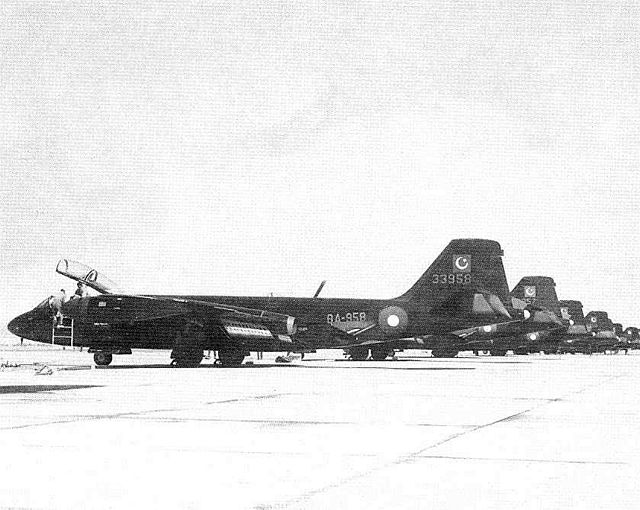 PAF B-57 Canberra bombers lined up at an airbase.