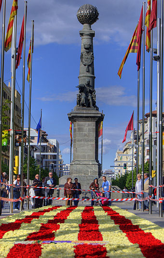 La Plaza de Aragón square in Zaragoza, on Saint George's Day, with a flag of Aragon of flowers