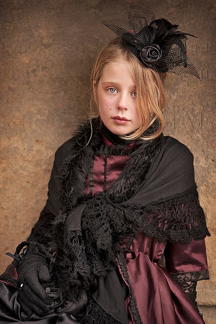 Girl dressed in a Victorian costume during the Whitby Gothic Weekend festival in 2013