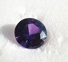 A 0.37-carat (0.074 g) brilliant cut purple Yogo sapphire. Only about two percent of Yogo sapphires are purple. PurpleY6Br.jpg