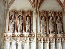 The six sculptures of apostles on the west side of the porch interior. They are, from left to right, Saints Phillip, Bartholomew, Matthew, Simon, Judas and Mathias.