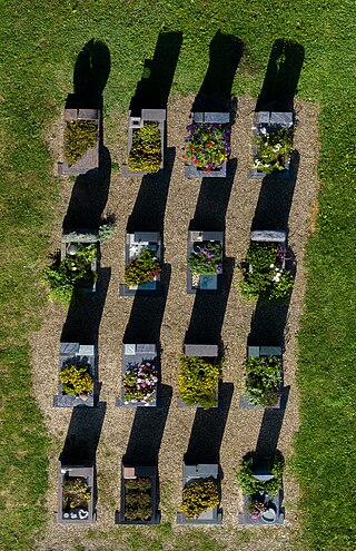 Graves at the cemetery of Sonnefeld, Upper Franconia, Germany, seen from above