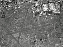 RAF Squires Gate in summer 1945. The Vickers factory is top right with 23 Wellington bombers scattered below. Avro Ansons of the No. 3 School of General Reconnaissance can be seen at top and lower right Squires Gate vertical 10.08.45.jpg