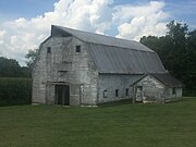 Smaller barn, with a hay hood