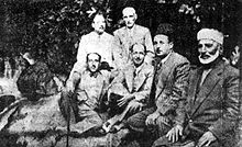 Seated from left to right: Shukri al-Quwatli (future president), Saadallah al-Jabiri (future prime minister), Rida al-Shurbaji (co-founder of the National Bloc), Sheikh Saleh al-Ali, commander of the Syrian Coastal Revolt of 1919. Standing are Hajj Adib Kheir (left) and Ibrahim Hananu, commander of the Aleppo Revolt Syrian nationalists.jpg