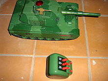 A toy tank with a remote control. Such toys are generally thought of as boys' toys. Tank toy radio.JPG