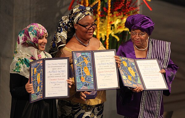 From left to right: Tawakkul Karman, Leymah Gbowee, and Ellen Johnson Sirleaf display their awards during the presentation of the Nobel Peace Prize, 1