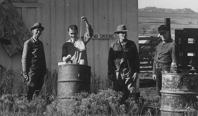 File:The butchering shed. Left to right, Vernon Bailey, R. L. Roudabush, Earl Drummond, and G. A. Smith. Roudabush... - NARA - 251655 (cropped).jpg