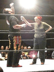 Dreamer and a fan drinking beer at an ECW live event Tommydreamerwithfan.jpg