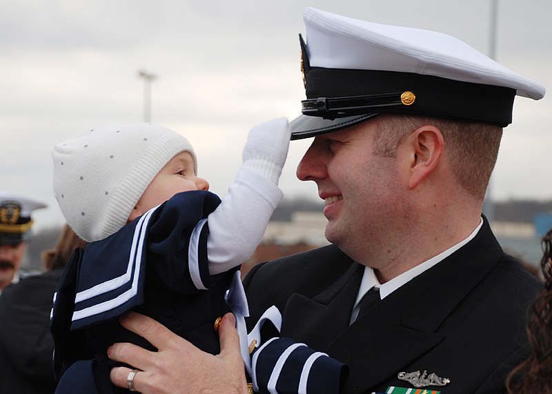 File:US Navy 111214-N-AW342-136 Chief Yeoman Matthew Gilliam is greeted by his daughter after returning from a scheduled 6-month deployment aboard the L.jpg