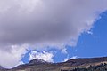 Wolkenluchten boven de bergtoppen rond Breil/Brigels.