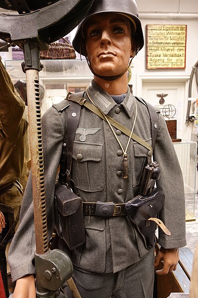 File:WW2 German uniforms Army Wehrmacht Heer Infantryman Stahlhelm fieldgear Field tunic Feldbluse breast eagle-and-swastika Gott mit uns buckle Whistle P38 Pistol holster Daimon flashlight etc Lofoten Krigsminnemuseum Norway DSC01577.jpg