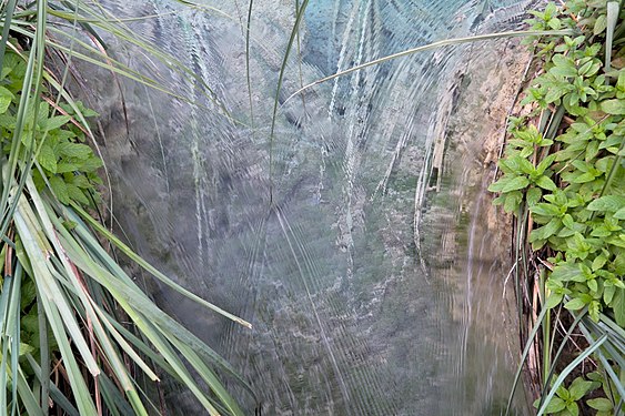 Water flowing through a narrow passage at Plitvice Lakes National Park in Croatia