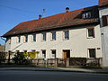 Former inventory house with a former prison