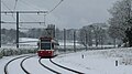 A tram on Gravel Hill in snowy conditions.