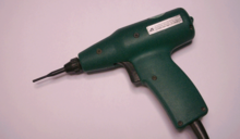 Electrical wire wrap tool; pneumatic (air-powered) tools are also available WrapGun.png