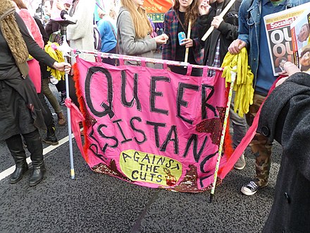 Queer resistance banner at a march
