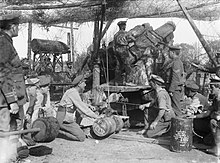 Shell marked "For Fritz" is readied for loading, bombardment of Thiepval September 1916 12inchHowitzerShellForFritzThiepvalSeptember1916.jpg