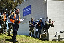 Navy Security Forces respond to a simulated attack during a force protection exercise on Naval Base San Diego. 190417-MJ716-196.jpg