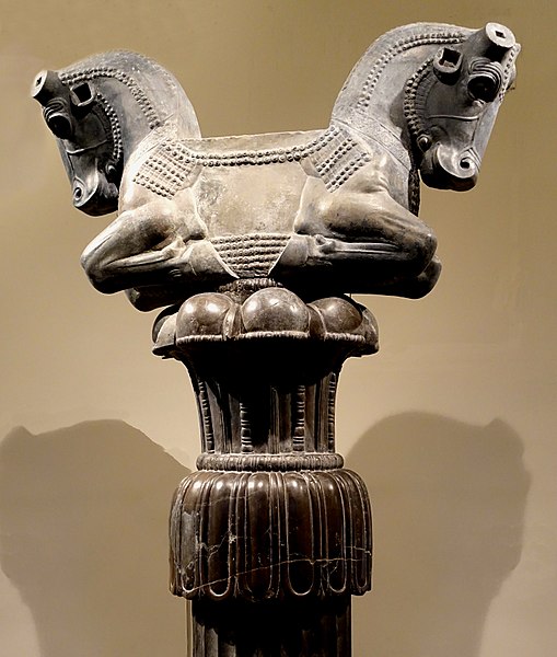 Highly polished Achaemenid load-bearing column with lotus capital and ashvins, Persepolis, c. 5th-4th BC.