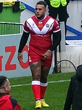 Fonua-Blake warming up for Tonga at the 2021 RLWC Addin Fonua Blake.jpg