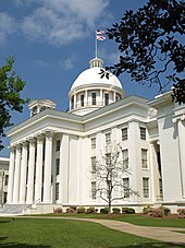 View of the west (front) portico, dome, and a portion of the south wing. Alabama State Capitol front Apr2009.jpg