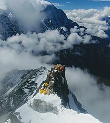 Ama Dablam's Camp II is set on a rocky outcrop at approximately 6,100 m (20,000 ft). It often serves as the final resting point before climbers depart for the summit.