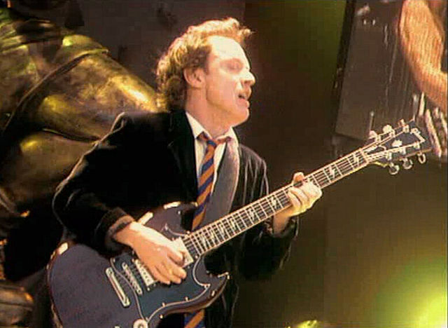 Founding mainstay guitarist Angus Young, performing in Munich in 2001