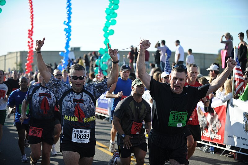 File:Army Capt. Iván Castro, a blind runner, and David L. Mann approach the finish line, 2011.jpg