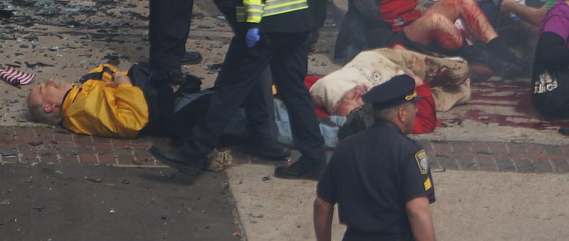 File:Boston Marathon explosions (8652877581) (two men laying on their backs on the bloody sidwalk).jpg