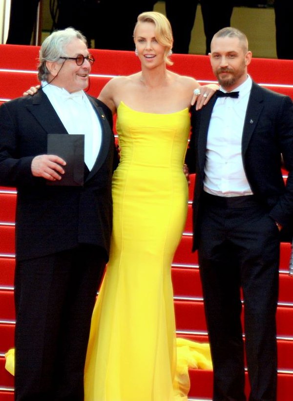 Hardy (right) with George Miller and Charlize Theron at the 2015 Cannes Film Festival