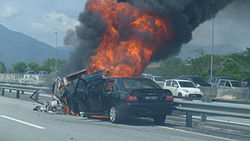 A severe rear-end collision that resulted in a burning wreckage along the North-South Expressway in Malaysia. All occupants escaped. Car accident - NSE Malaysia.jpg